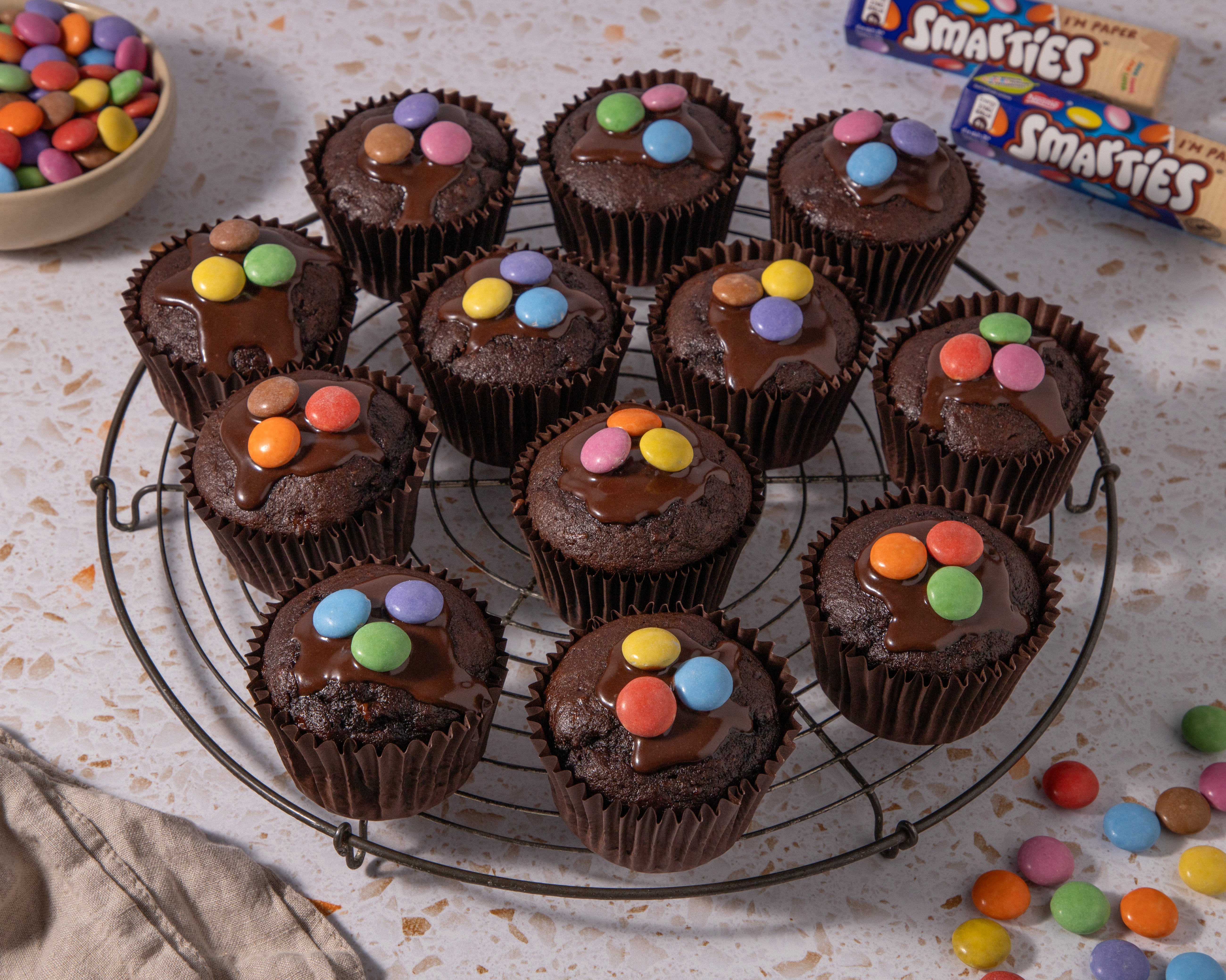 chocolate and banana muffins with smarties on top